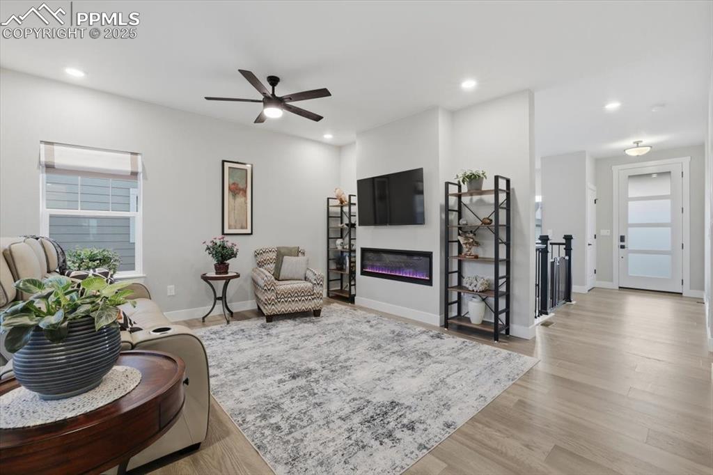 The focal point of the living room is this beautiful fireplace with TV mount over it.