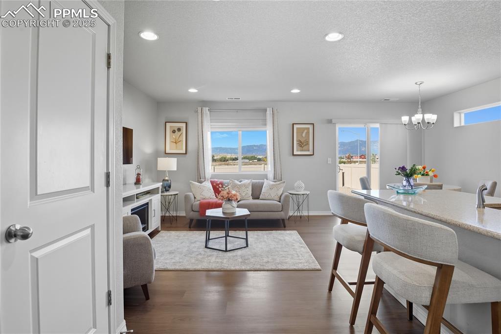 MAIN LEVEL OPENS INTO A BRIGHT AND AIRY LIVING ROOM