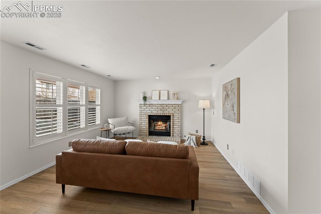 Lower level with refreshed fireplace