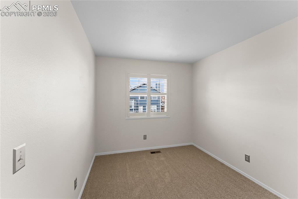 One of 3 upper level bedrooms