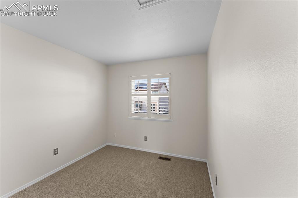 One of 3 upper level bedrooms