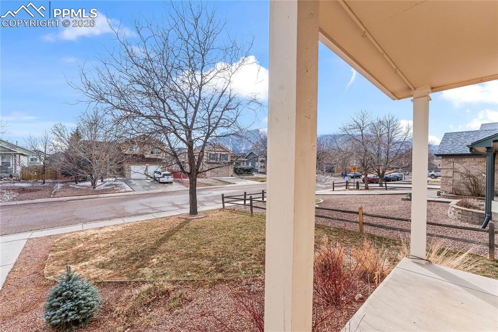Inviting front porch with amazing view of Cheyenne Mountain