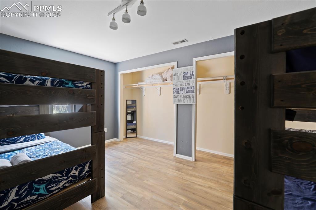 Lower Level Bedroom with Engineered-wood Flooring!