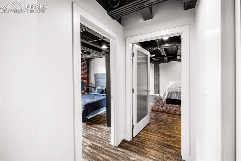 Corridor with dark wood finished floors