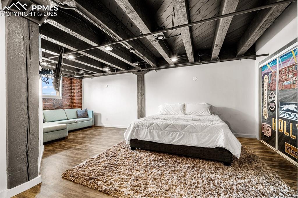Bedroom featuring wood finished floors