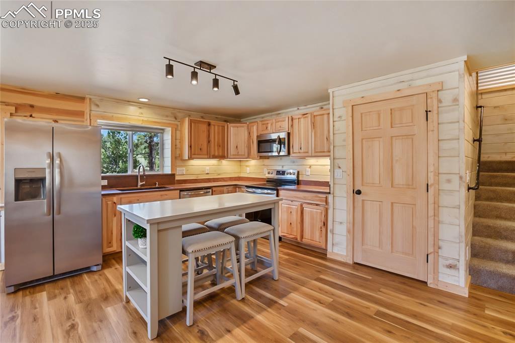 Kitchen has beautiful hickory cabinet's and pantry