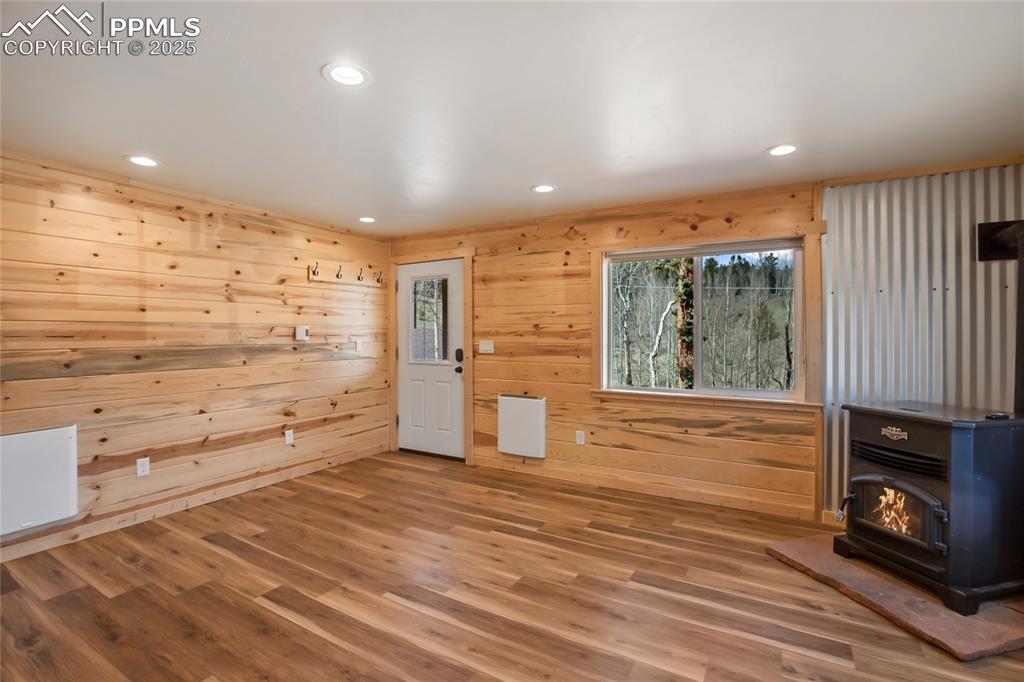 Living room with electric pellet stove that heats the entire house with ease