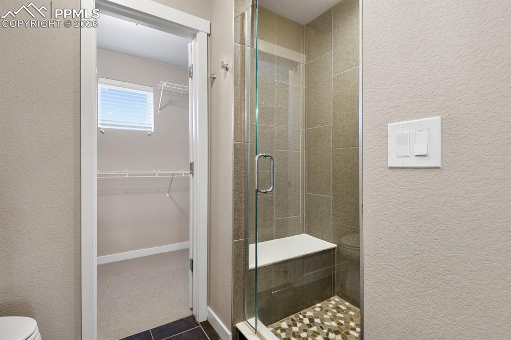 Primary Suite Shower With Bench
