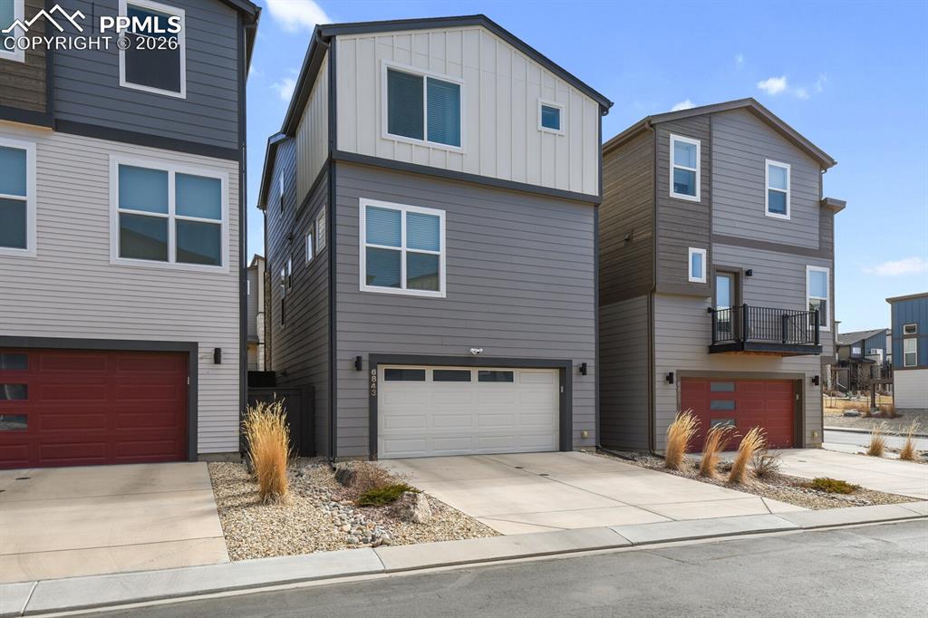 Back of Home with 2-Car Garage