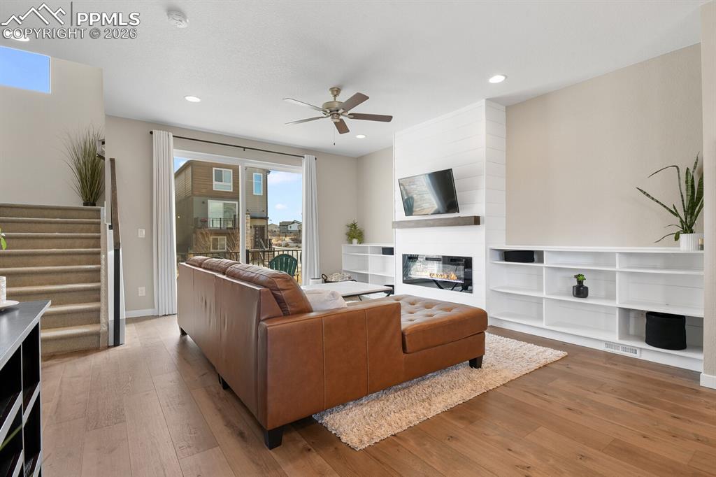 Great Room with Built-In Fireplace & Bookcases