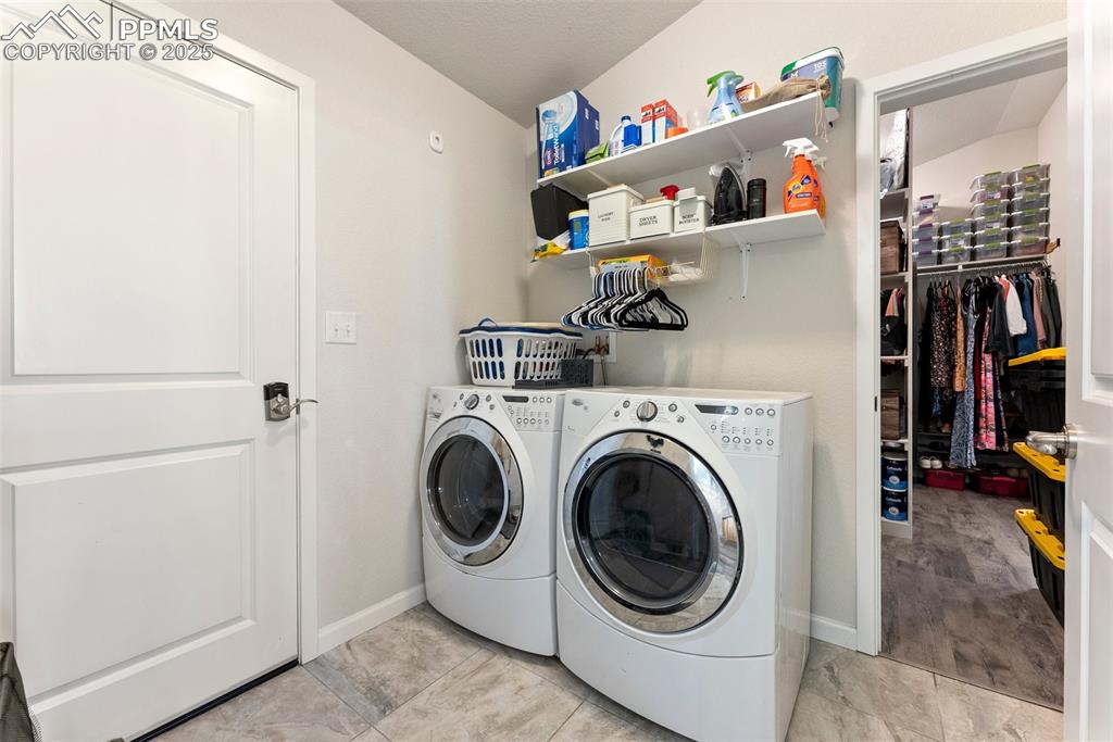 Laundry room with shelving & entrance to garage!