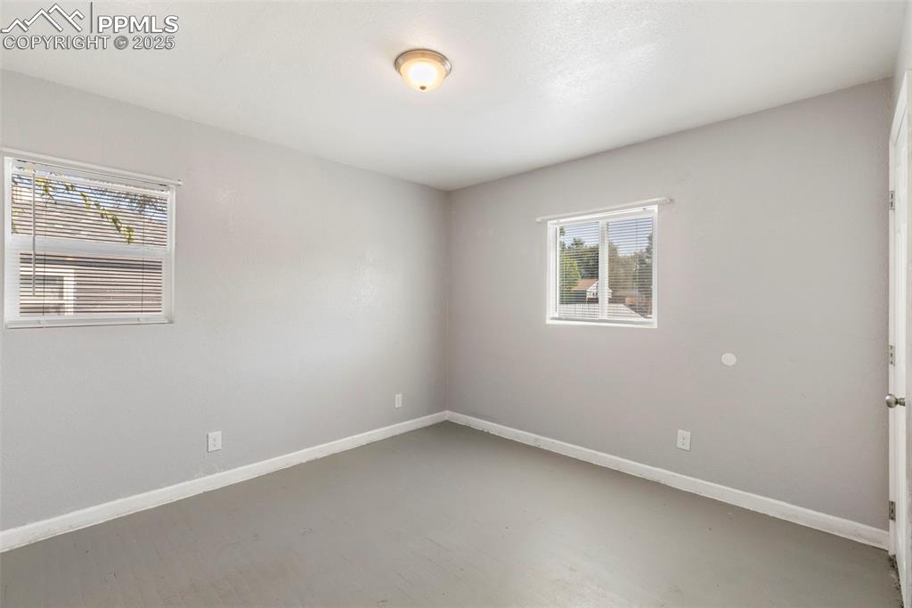 Empty room with baseboards