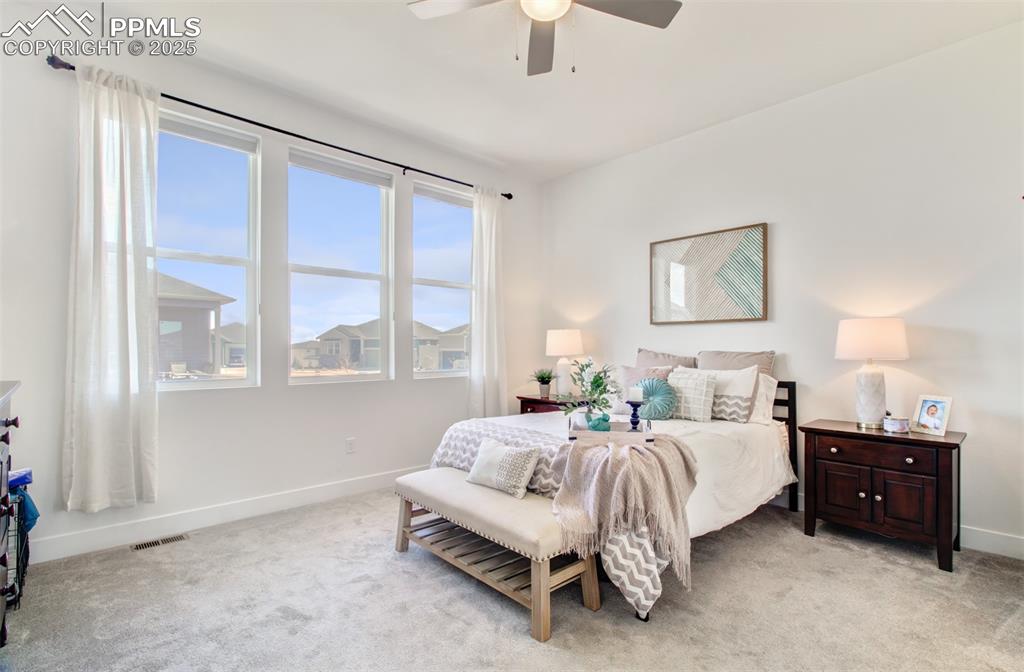 The spacious owner's retreat is tucked off of the great room