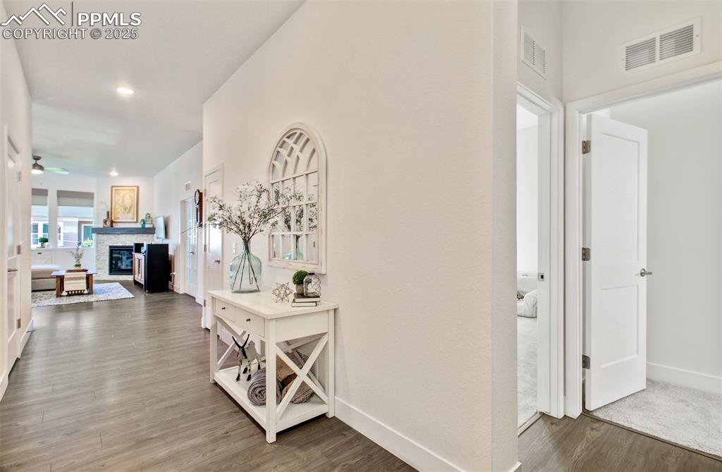 Spacious entry with wood laminate flooring