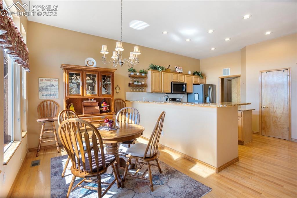 Enjoy family meals or entertain friends in this generously sized informal dining area. Walk out to the patio from this room to savor your morning coffee in the outdoors.