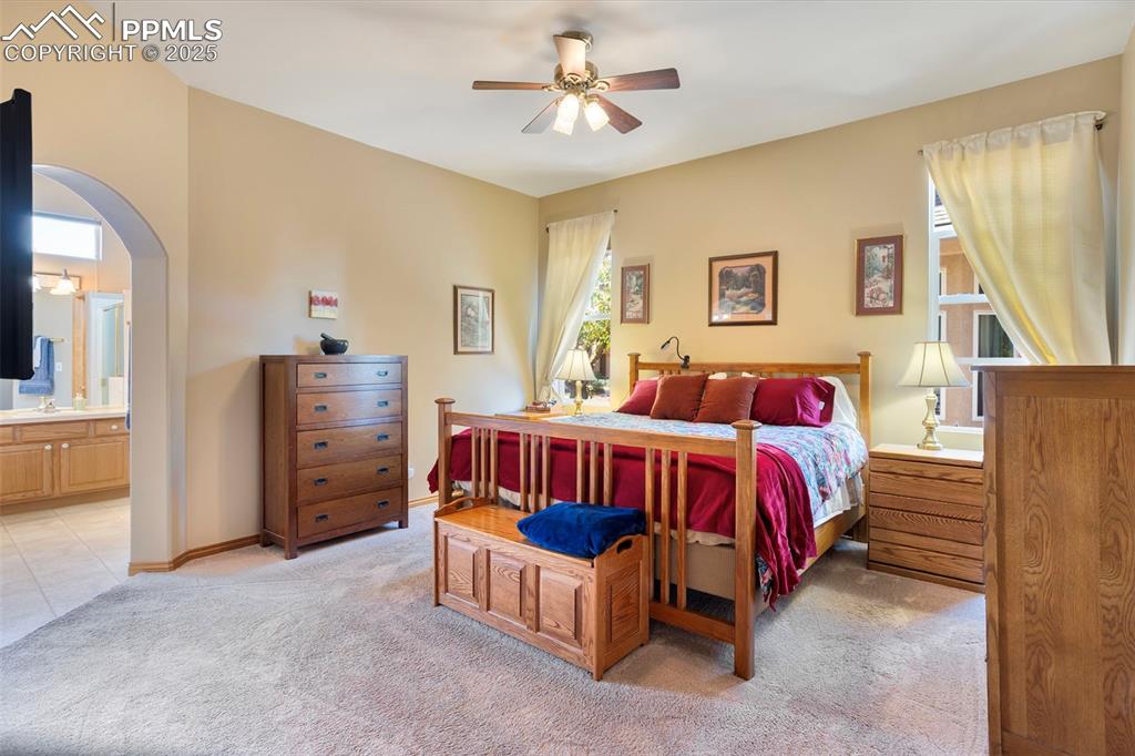 The spacious primary suite will be your retreat for relaxation.