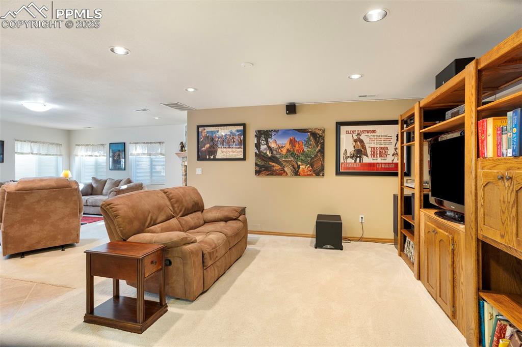 The basement family room offers additional living space for relaxing in front of the TV.