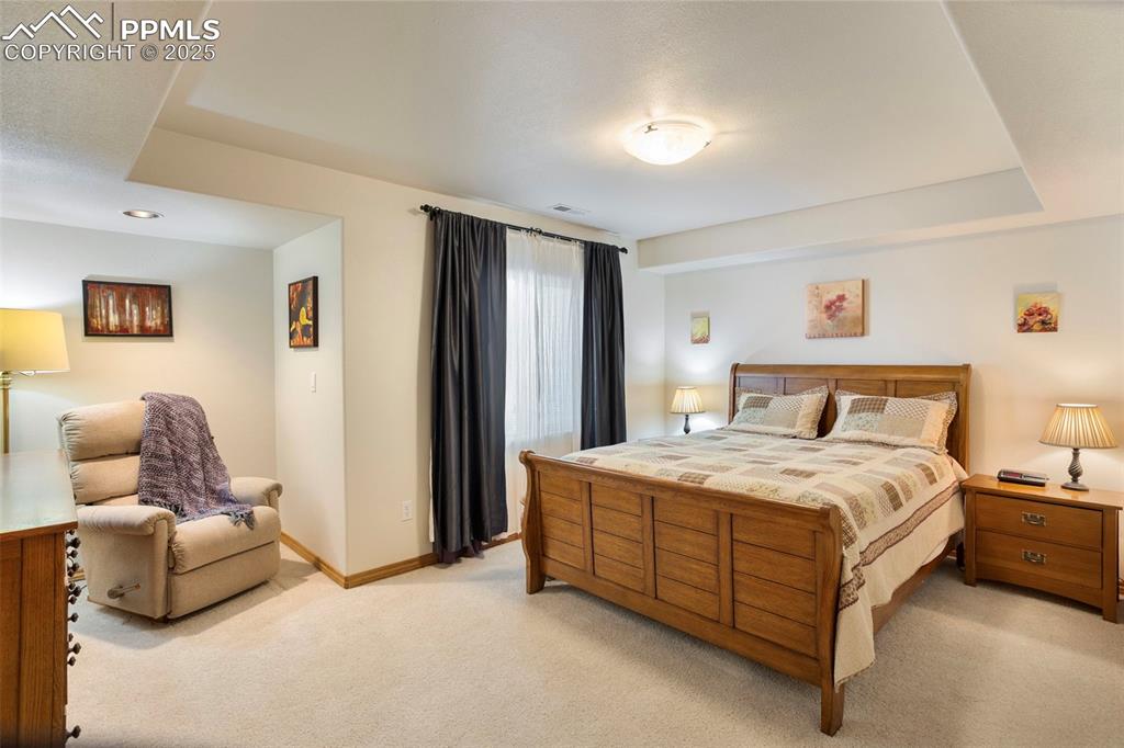 Spacious basement bedroom #2 features a coffered ceiling.