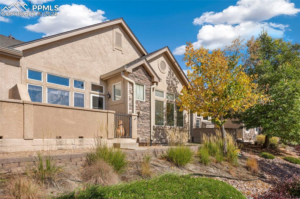 Side view of home shows the patio location.