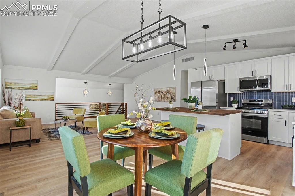 Open Dining with Statement Lighting