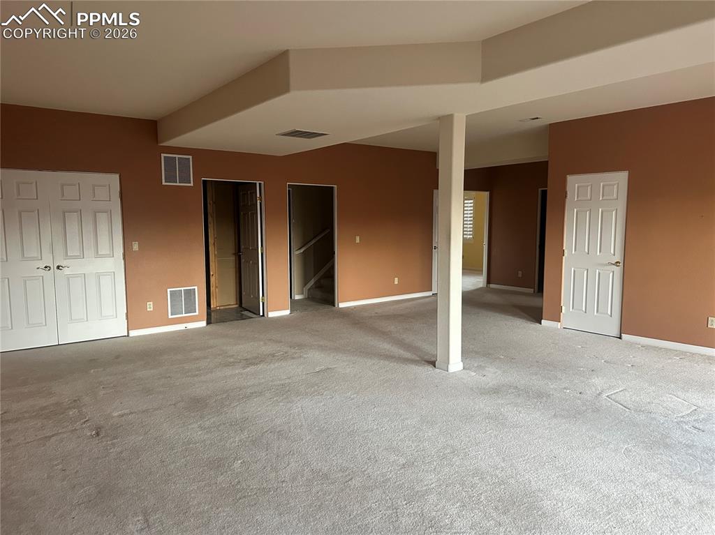 Family room has two sliding glass doors to the deck