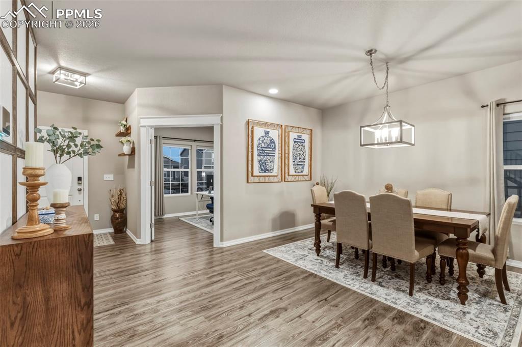 Dining room featuring recessed lighting and light wood-style flooring