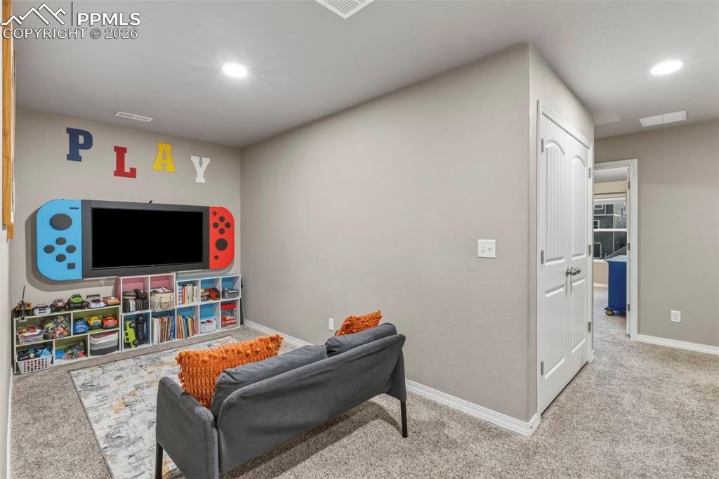 Rec room featuring carpet and recessed lighting