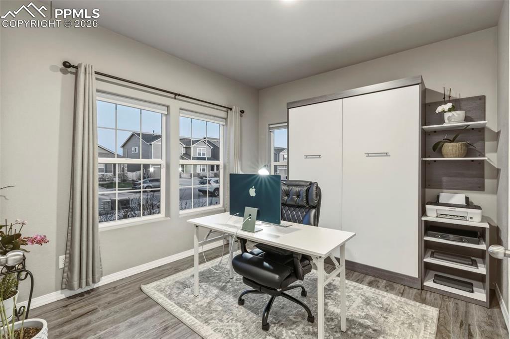 Office featuring light wood finished floors and baseboards