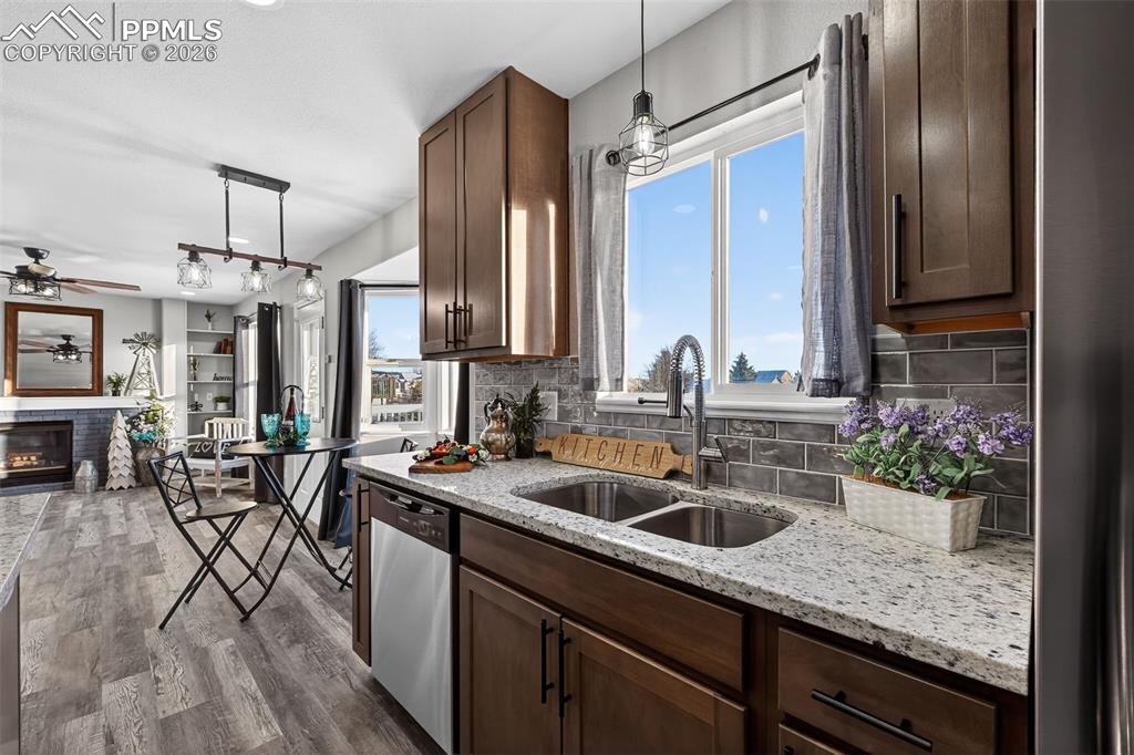 All new custom tile backsplash and the slab granite countertops.