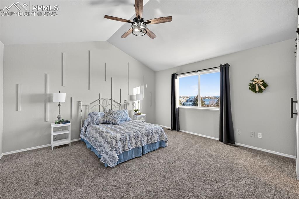 A designer element with the wall and a new ceiling fan. 