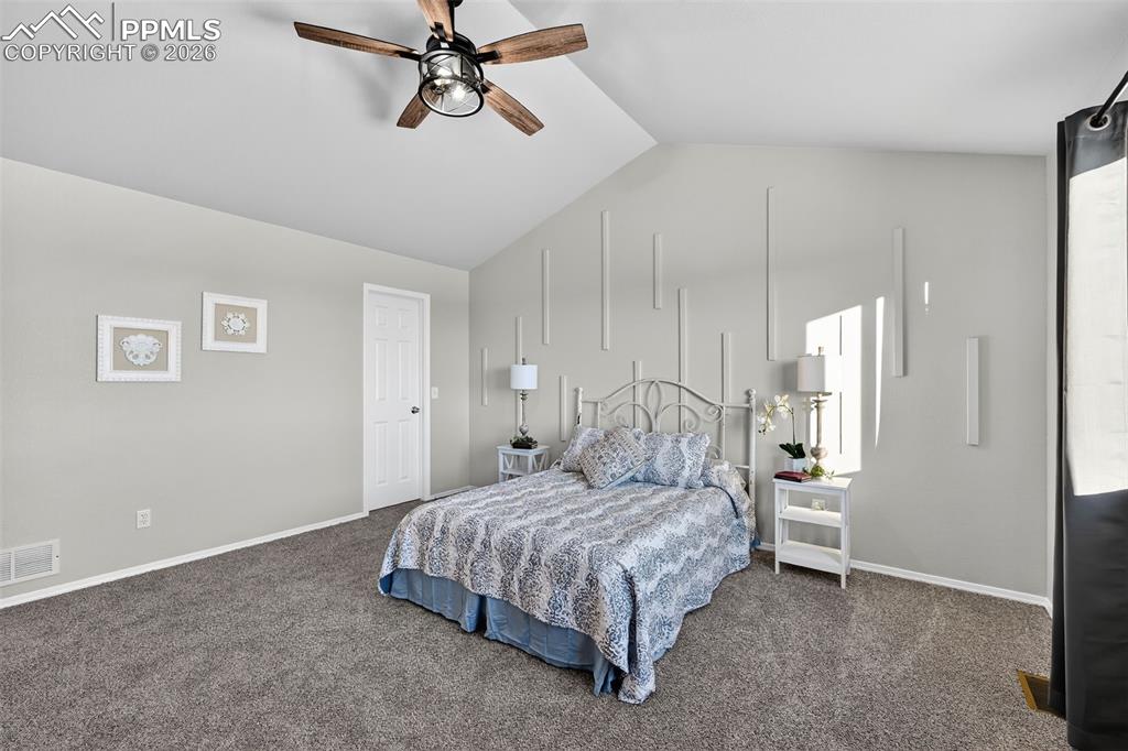 The walk in closet on the left and vaulted ceilings make it feel even bigger!