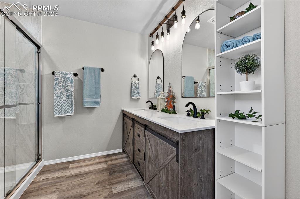 A double vanity with plenty of room for 2 people to get ready for an event.