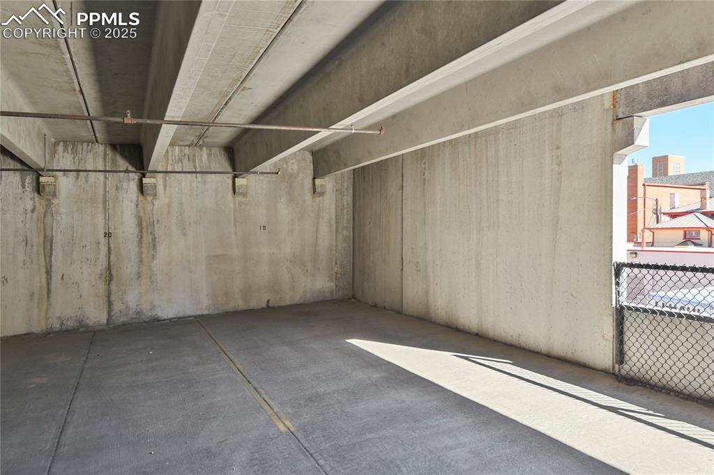 Covered, deeded parking space in adjacent garage