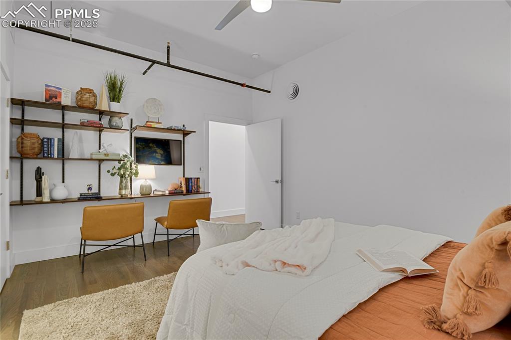 Wall of shelving ideal for home office space!