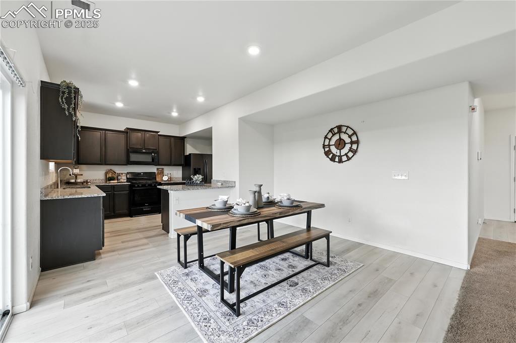 View of the Dining Area into the Kitchen.
