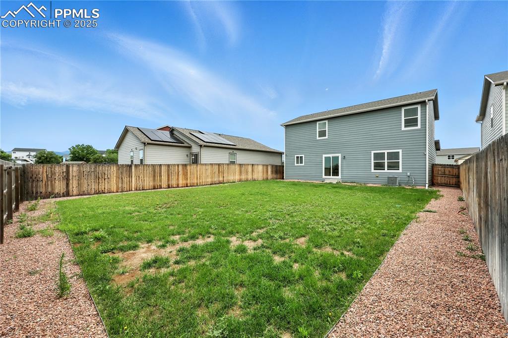 Low maintenance, fenced backyard.