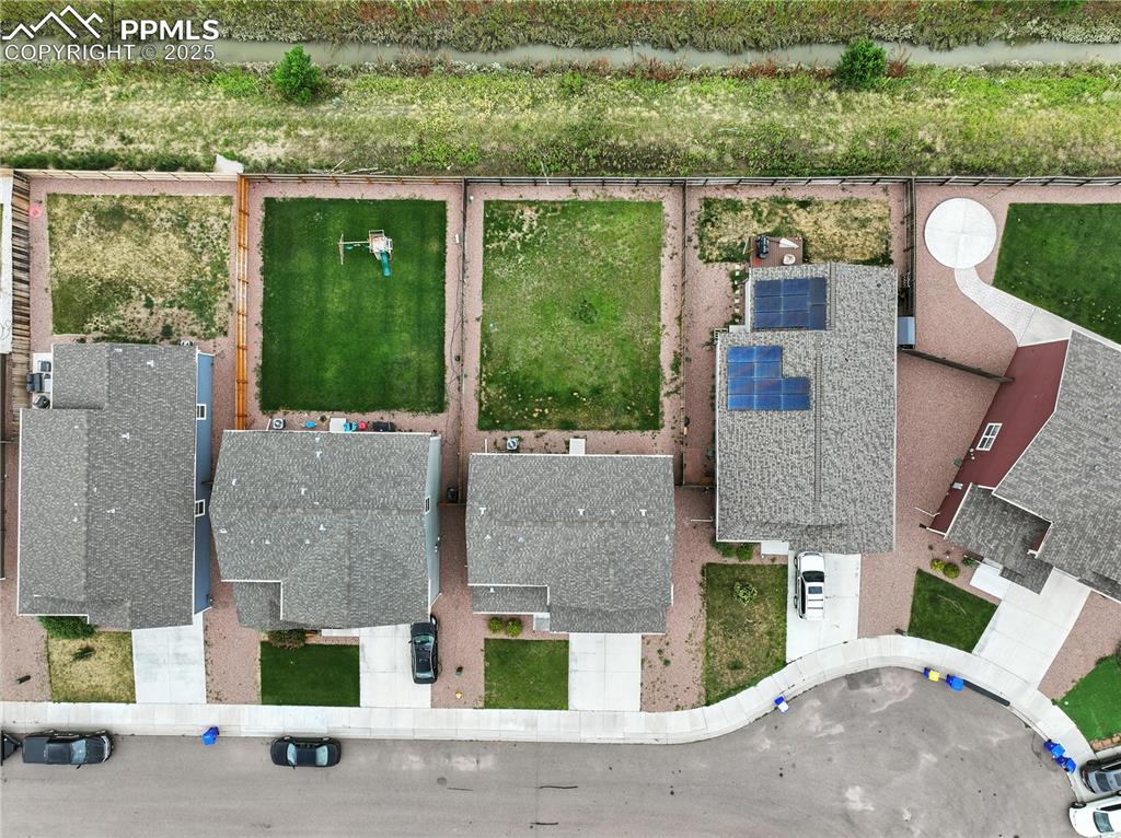 Aerial view of home and lot.