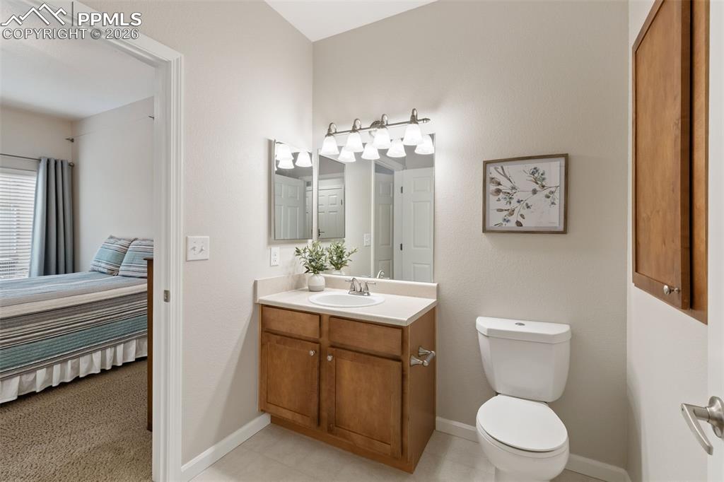 Ensuite bathroom with toilet and vanity