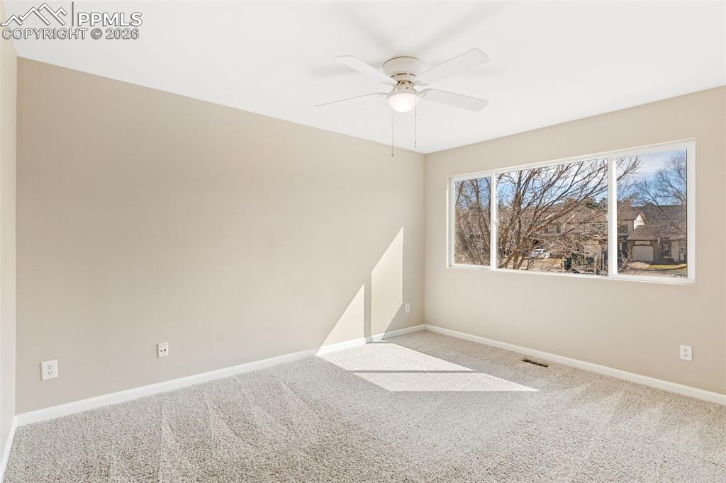 Large, light and bright master bedroom with walk-in closet and updated master bath.