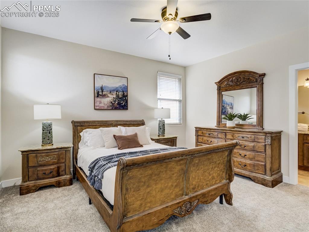 Secondary upstairs bedroom with en-suite bath.