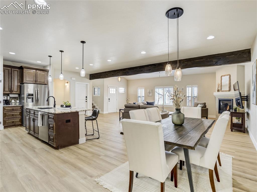 Open dining area seamlessly connected to the kitchen and great room.