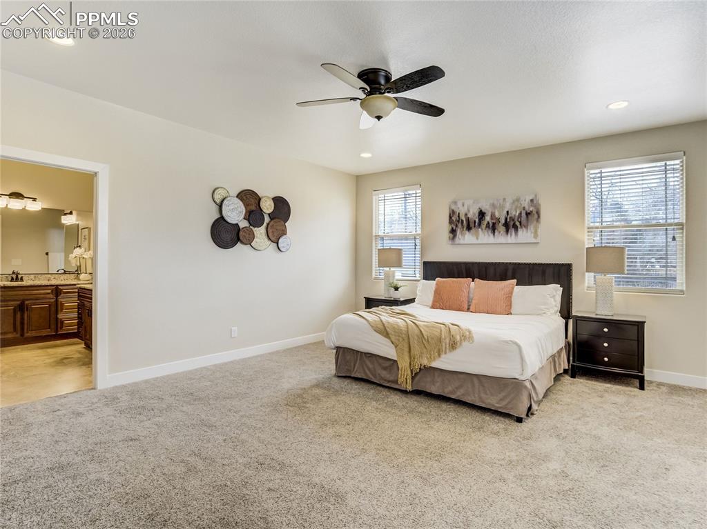 Spacious primary suite with abundant natural light and private en-suite bath. 