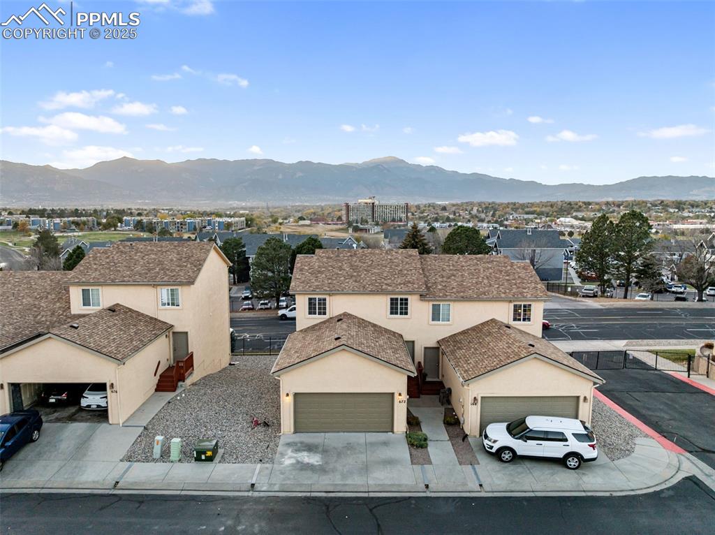 View of mountain background with nearby suburban area