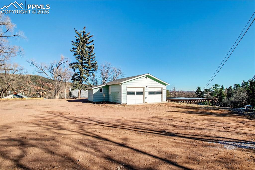 Lot 2 (with oversized garage w/separate storage, and storage shed) and buildable Lot 3