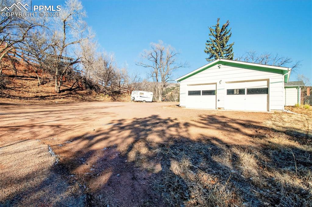 Lot 2 (with oversized garage w/separate storage and workshop, and storage shed) and buildable Lot 3