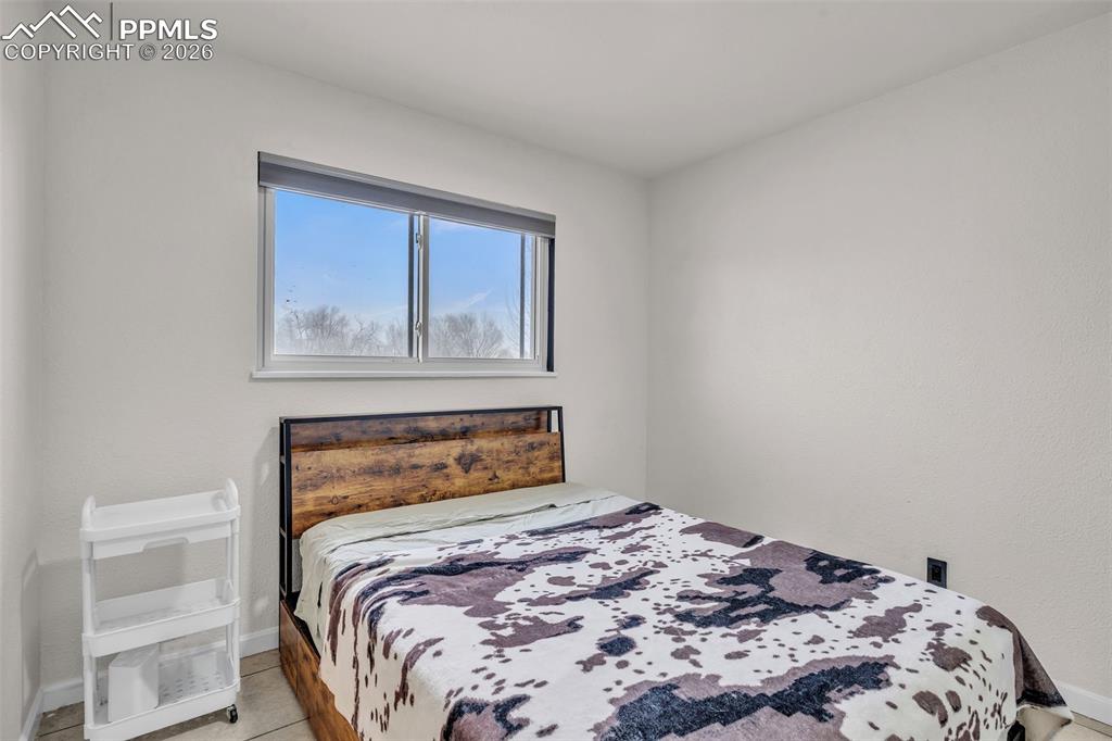 Bedroom with baseboards