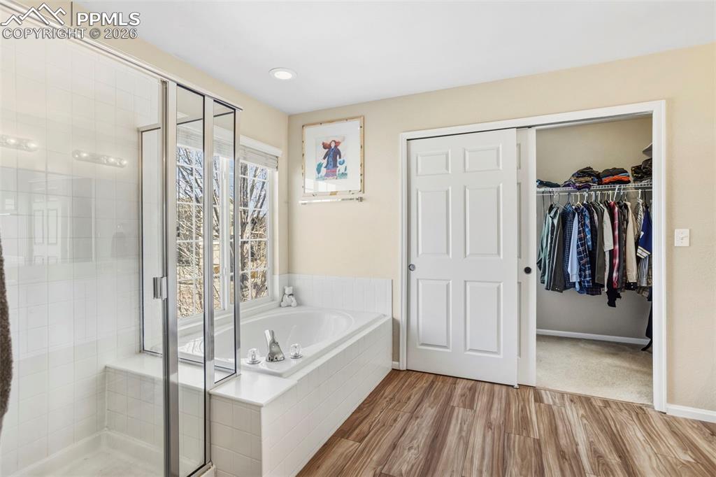 Primary Bathroom with walk-in closet