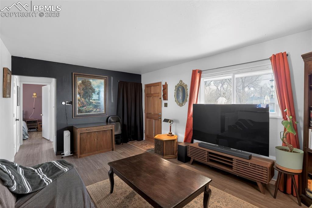 Living area featuring wood finished floors