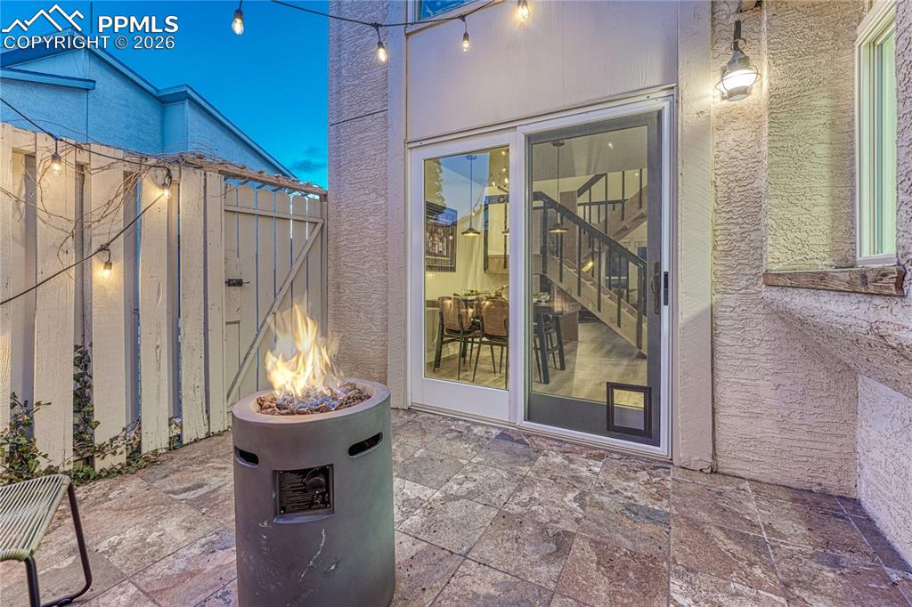 A gate to the exterior side yard and back yard