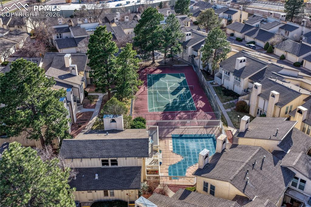 Clubhouse with pool and pickleball/tennis courts
